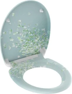 SCHÜTTE WC-Bril 82381 FLOWER IN THE WIND - Duroplast - Soft Close - Afklikbaar - RVS-Scharnieren - Decor - 3-zijdige Print -Badkamer Producten Winkel 919x1200
